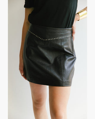 MINI CUERO TACHAS