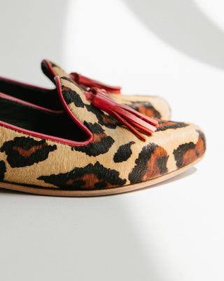 MOCASIN CUERO ANIMAL PRINT PELO BORLAS