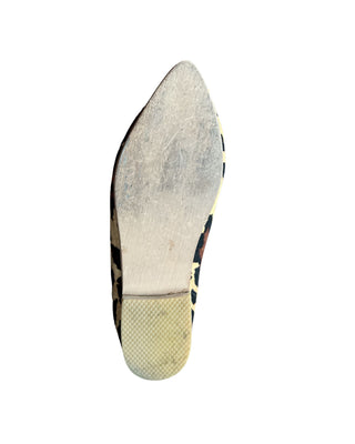 MOCASIN CUERO ANIMAL PRINT PELO BORLAS